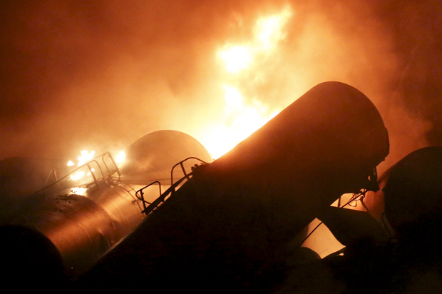 A CSX Corp train burns after derailment in Mount Carbon, West Virginia, February 16, 2015.  (Credit: Reuters/Marcus Constantino)